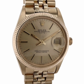 Estate Rolex 14 Karat Yellow Gold Gents Oyster Perpetual Date Champagne Dial Fluted Bezel Jubilee Bracelet 15037 C.1981