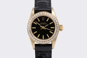 Rolex Oyster Perpetual 67197 14k Yellow Gold 24mm Watch